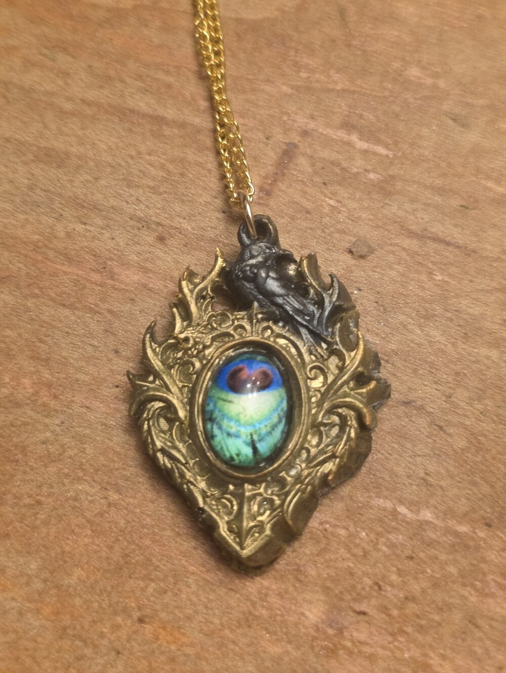 Gold & Black Raven Pendant With Colorful Cabochon Graphic On Gold Tone Chain